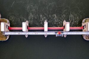 Aerial drone shot of a modern hydroelectric power station in Welch, MN.
