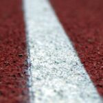 Detailed image of a running track line highlighting texture and pattern.